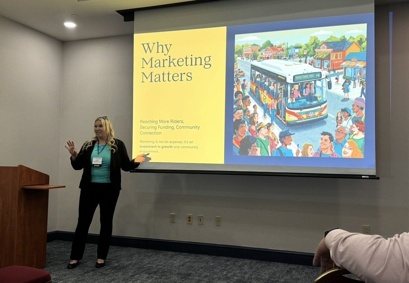 Michelle Robertson presenting a Why Marketing Matters transit slide about ridership, funding and community connection